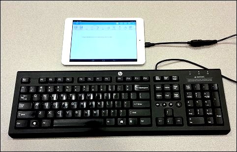 Tablet with keyboard attached using an OTG cable