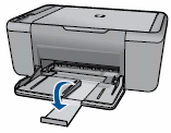 Illustration of lifting out paper tray extension.