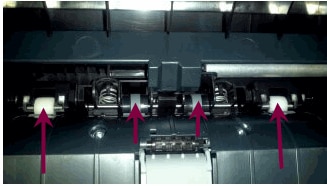 Image: Clean the rollers behind the ADF mechanism