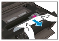 Image: Remove paper from the ink cartridge access area.
