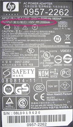Image:  Voltage and amperage specifications printed on the power supply