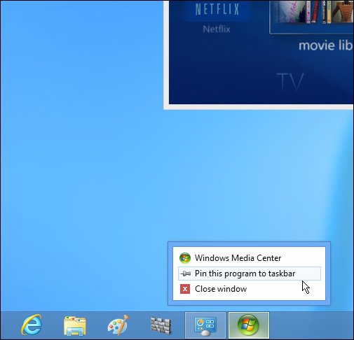 The  Windows 8 desktop with the Windows Media Center icon right-clicked, and Pin this program to the taskbar selected.