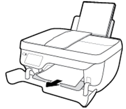 Imagen: Retirar el papel atascado del interior de la impresora