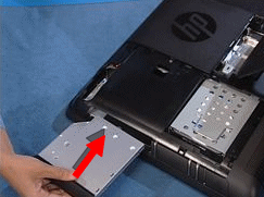 Sliding the CD/DVD drive into the computer