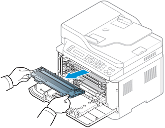Removing the toner cartridges from the inside of the printer.