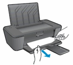 Image: Gently pull the paper out of the tray.