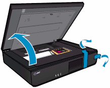Image: Remove the packing material from inside the printer.
