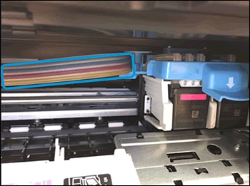 Example of a printer out of ink with ink stained tubes
