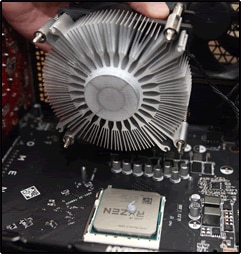 Centering and aligning the processor fan on the motherboard