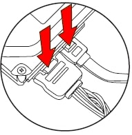 Squeezing the CD/DVD drive connector latches