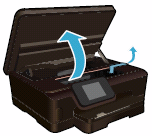 Open the cartridge access door and  remove the packing tape