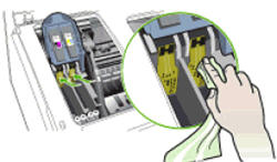 Illustration of reaching inside the product and cleaning the electrical contacts with a clean, dry cloth.