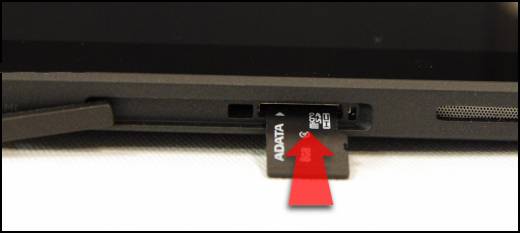  Photo showing a memory card partially inserted into the microSD card slot.