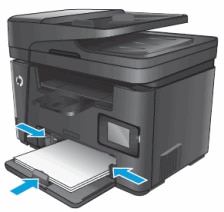 Image: Slide the paper guides in until they rest against the paper