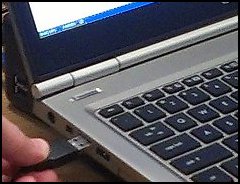 Plug  the mouse into a USB port