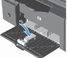 Image:  Attach the paper extender tool to the front of the tray