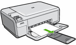 Illustration of removing loose paper from the tray