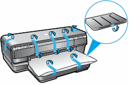 Image: Remove the tape and packing material from the front of the printer.