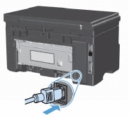 Imagen: Conecte el cable de alimentación a la parte posterior de la impresora