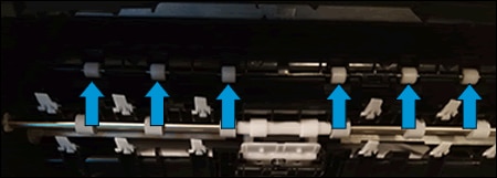 Image: Clean the rollers in the rear of the printer