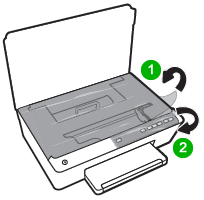 Image: Remove the materials from the cartridge access area and on the control panel.