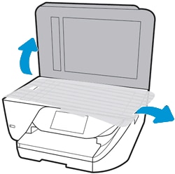 Removing packing materials from under the scanner lid