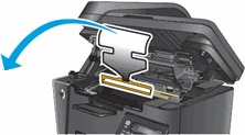 Image: Remove packaging from inside the printer.