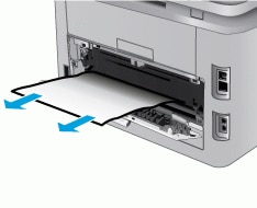 Remove any jammed paper